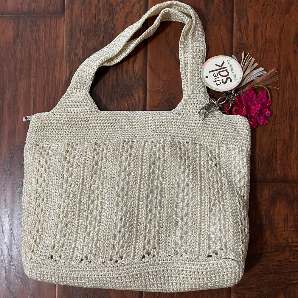 The Sak hand crocheted cream bag
